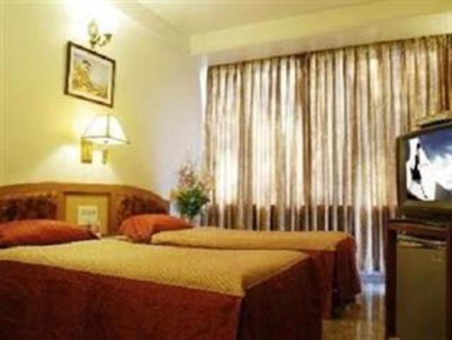 The Ambience Hotel Pune Phòng bức ảnh