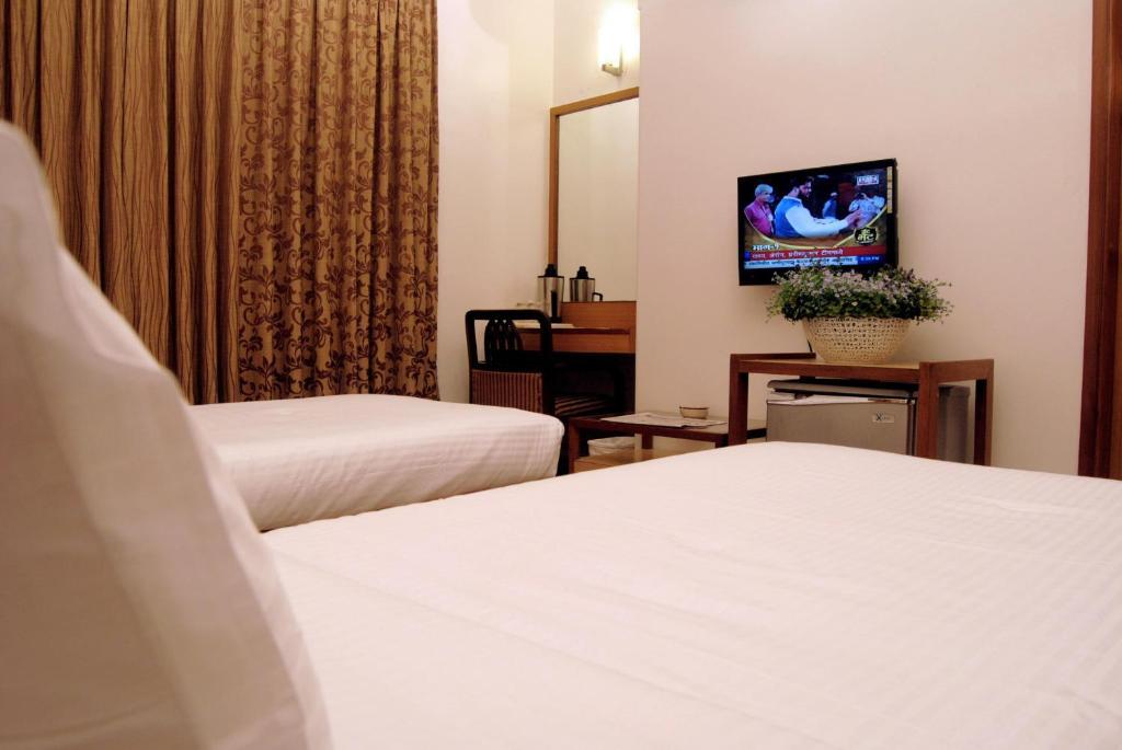 The Ambience Hotel Pune Phòng bức ảnh