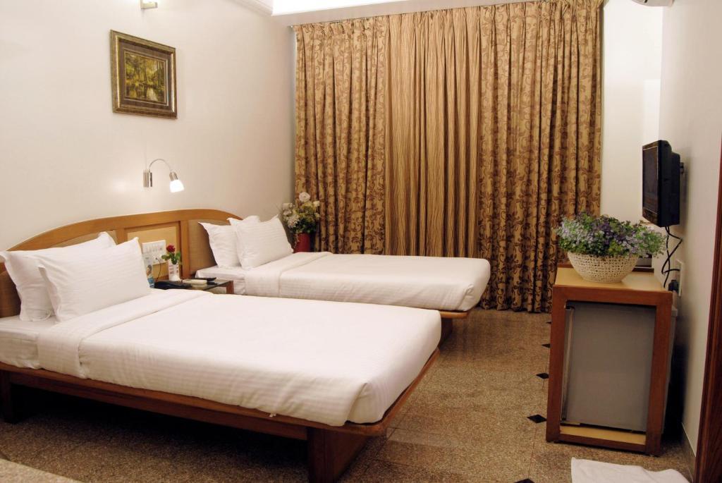 The Ambience Hotel Pune Phòng bức ảnh