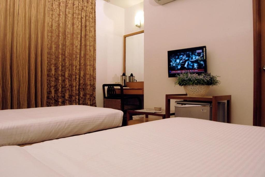 The Ambience Hotel Pune Phòng bức ảnh